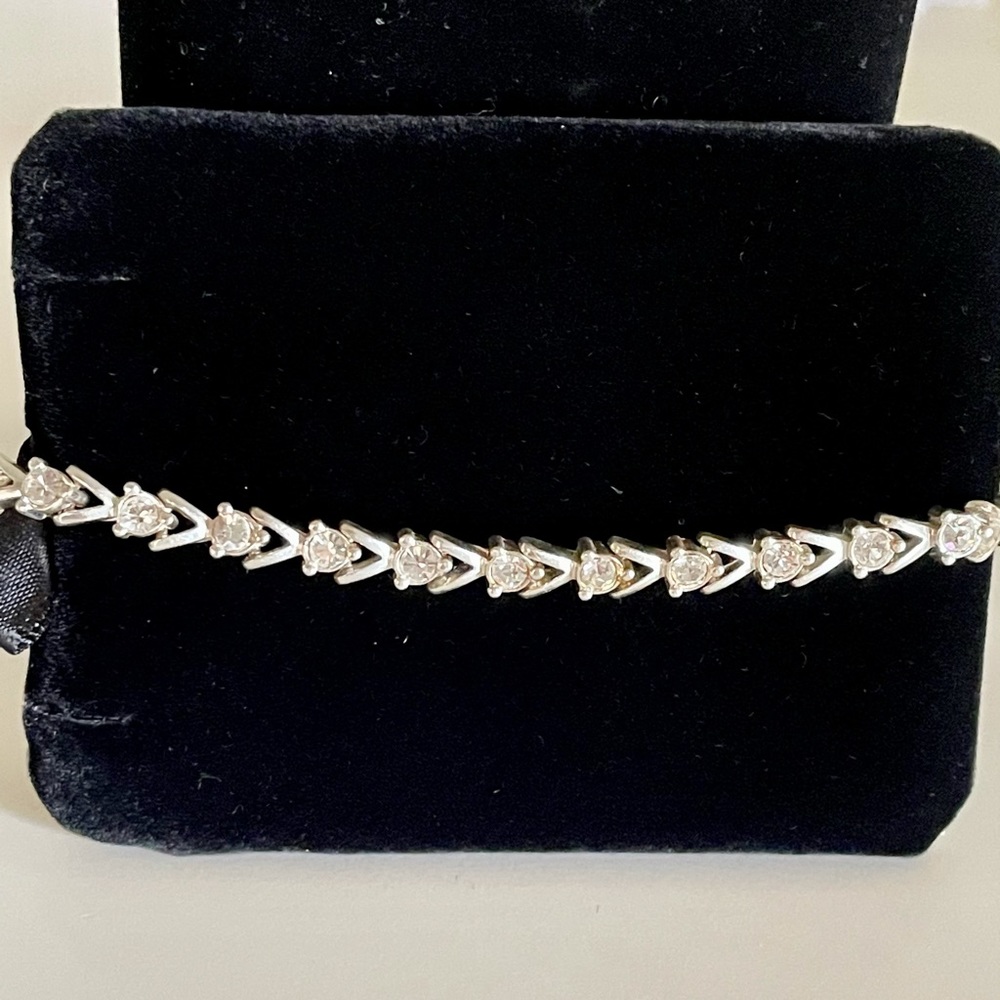 Avon Silver tone and faux diamond bracelet